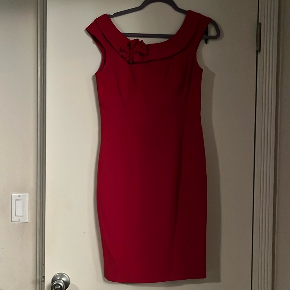 Red Calvin Klein dress with scoop neck and flower detail